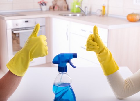 Carpet cleaners team sorting recyclable cleaning materials in East London
