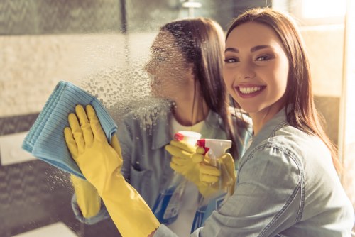 Commercial cleaners maintaining washrooms and communal areas in E3